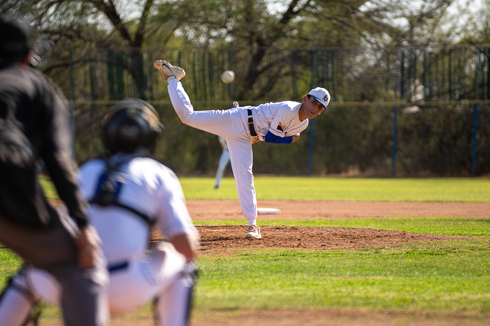 A Titan pitcher throws a pitch