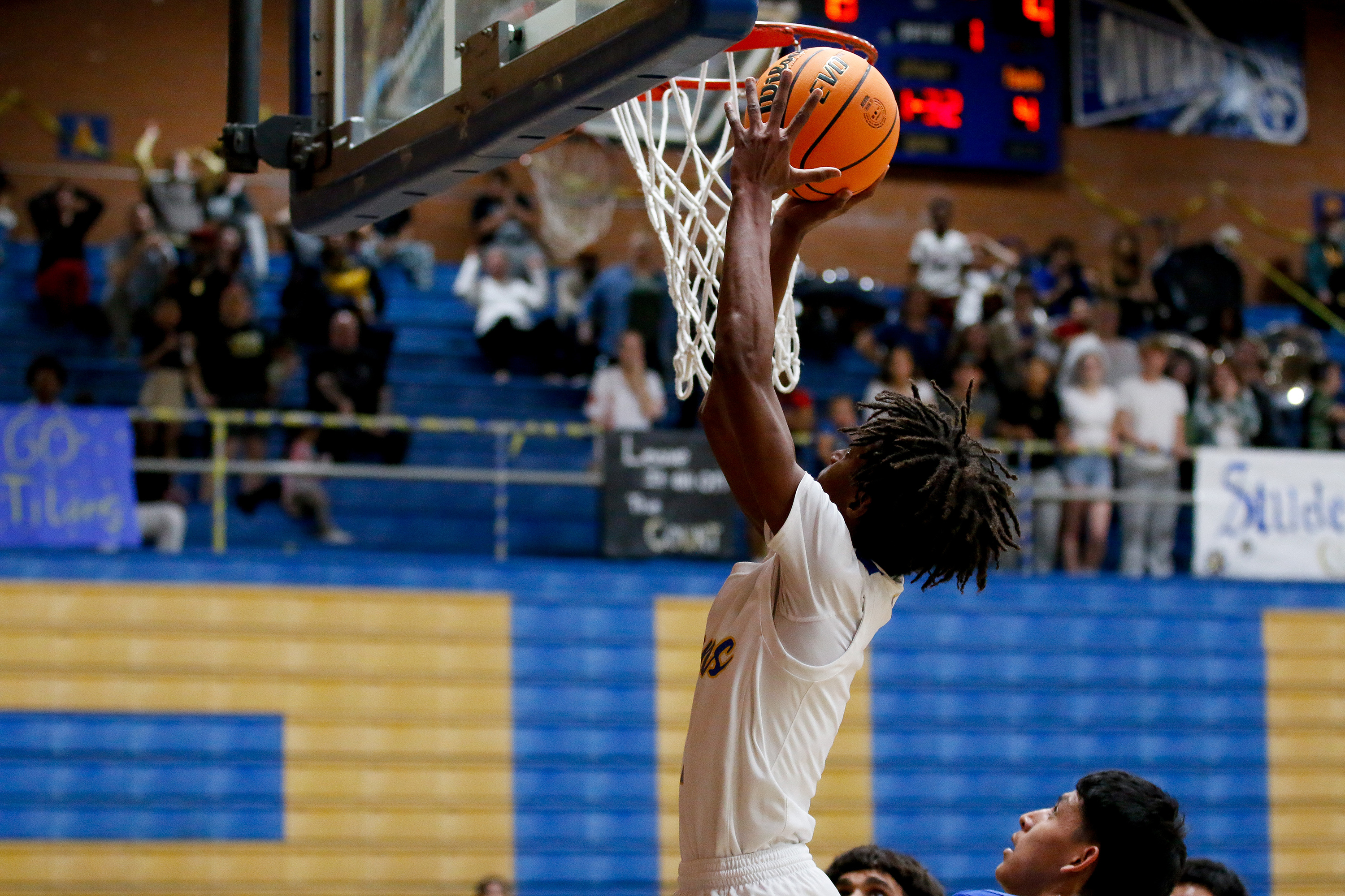 A PV player goes in for a layup