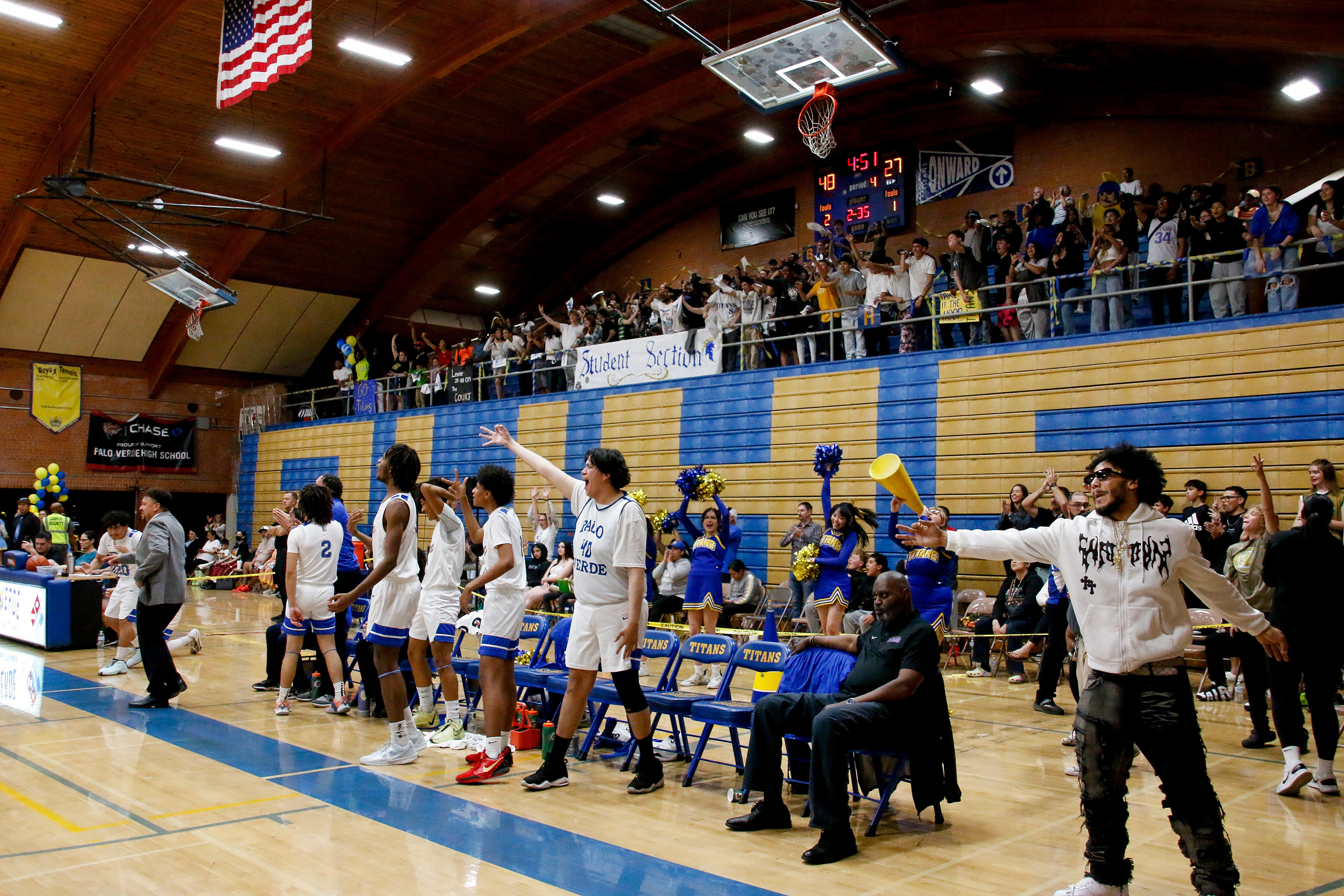 PV players on the sidelines cheer on their teammates