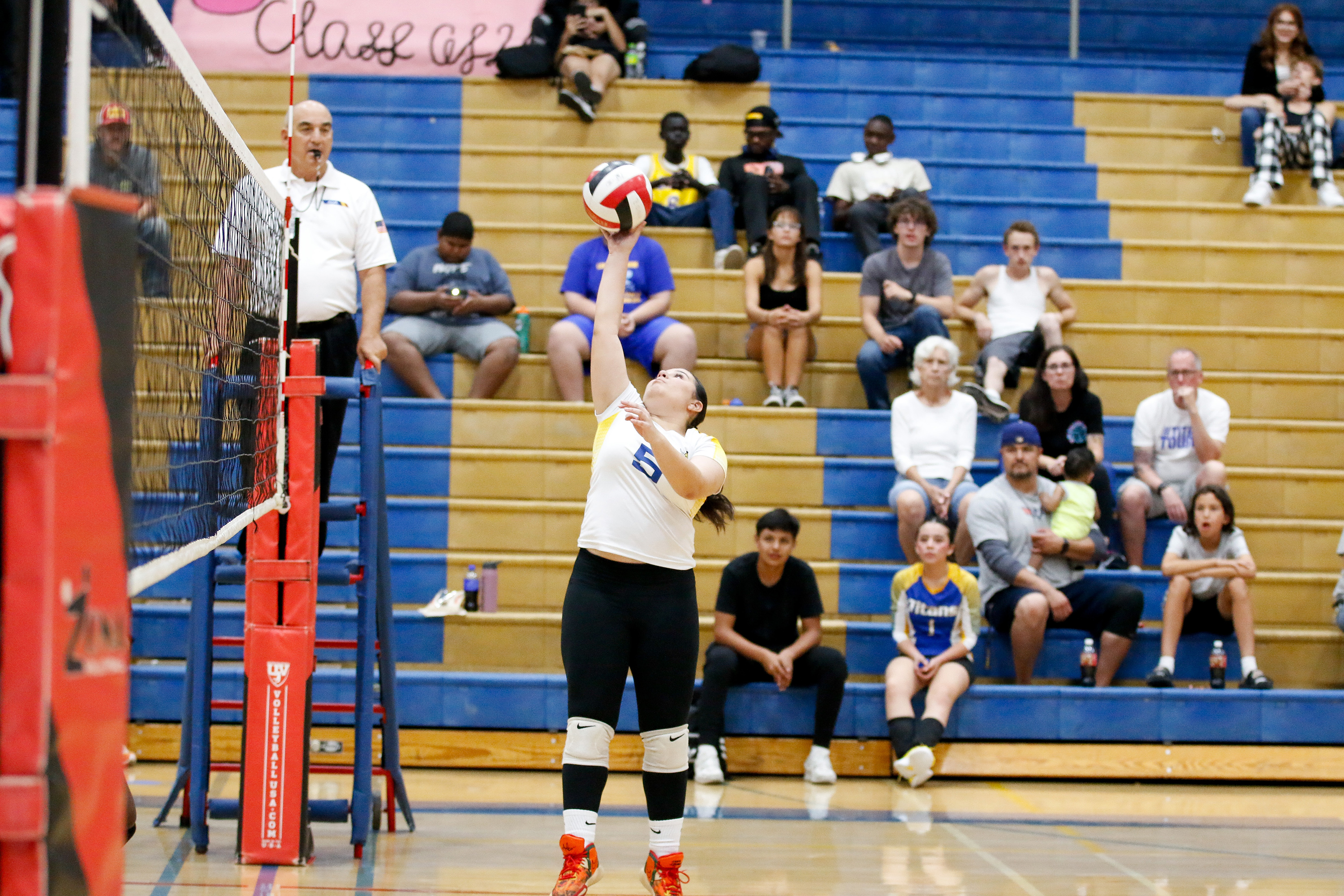  A Palo Verde volleyball player reaches up for the ball