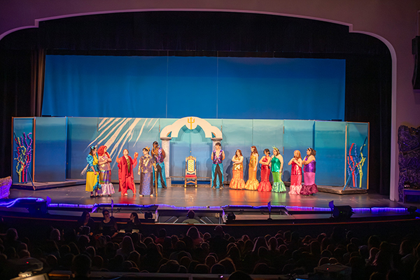 High school students perform The Little Mermaid for elementary students