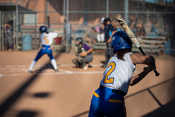 A girl gets ready to swing the bat